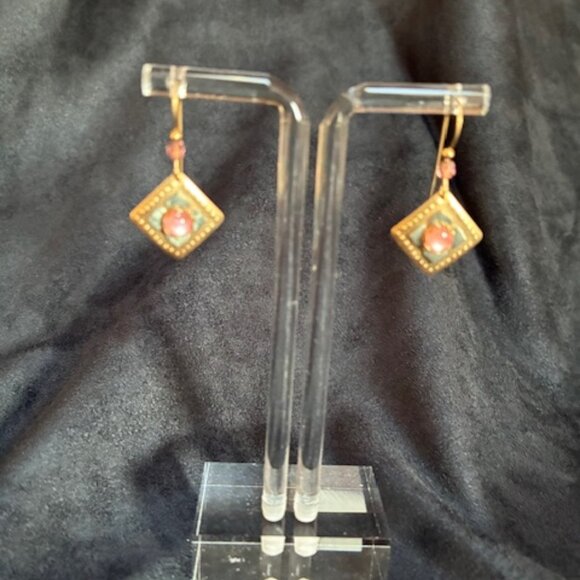 Dangling gold tone earrings with pink and green flowers. - Picture 1 of 4